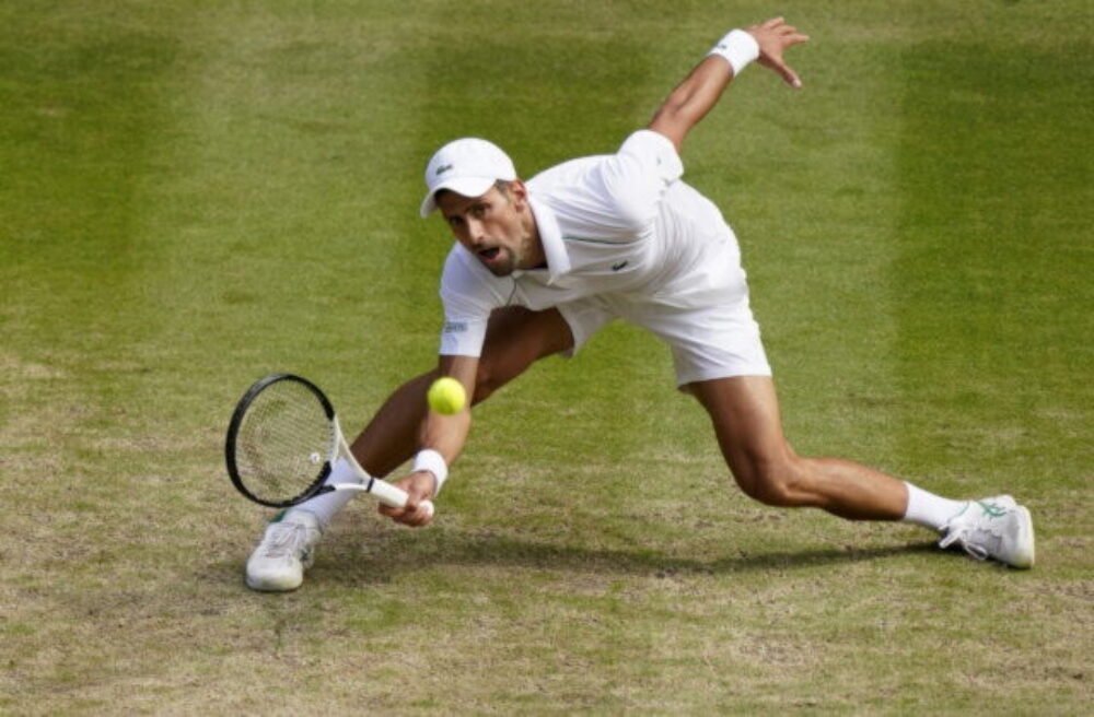 74722_britain_wimbledon_tennis_00873-531b741b77fe4292854f2b74cbbc2a76-scaled-2-640x420.jpg Djokovič uspel v rekordnom wimbledonskom zápase vo štvrťfinále dvojhry mužov – VIDEO