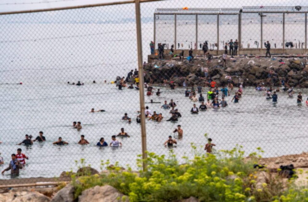 75601_spain_ceuta__5445-640x420.jpg Top foto dňa (31. júl 2026): Migranti, útulok pre rodiny, vojenský útok, protest a dráhová cyklistika